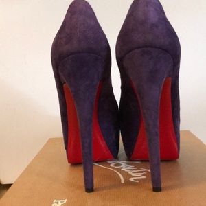 Purple suede peep toe Christian Lou out in heels